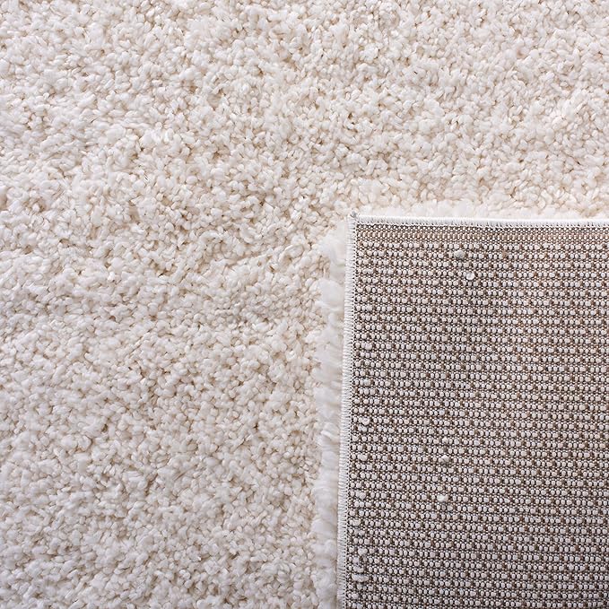 SAFAVIEH Fontana Shag Collection Area Rug - 6'7" x 9', Ivory, Solid Design, Non-Shedding & Easy Care, 2-inch Thick Ideal for High Traffic Areas in Living Room, Bedroom (FNT800A)
