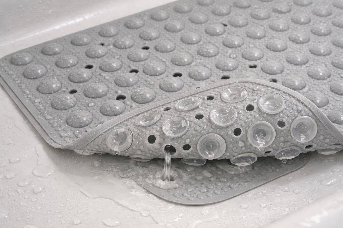 textured bathtub mat in tub showing suction cups and drainage