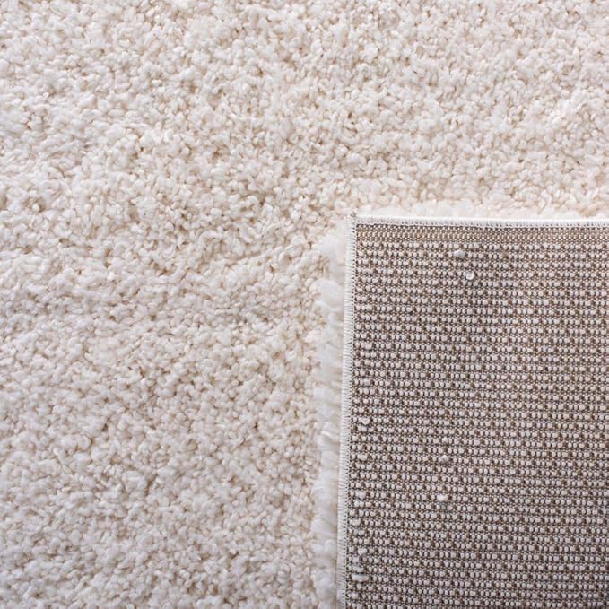 SAFAVIEH Fontana Shag Collection Accent Rug - 2'3" x 4', Ivory, Solid Design, Non-Shedding & Easy Care, 2-inch Thick Ideal for High Traffic Areas in Entryway, Living Room, Bedroom (FNT800A)