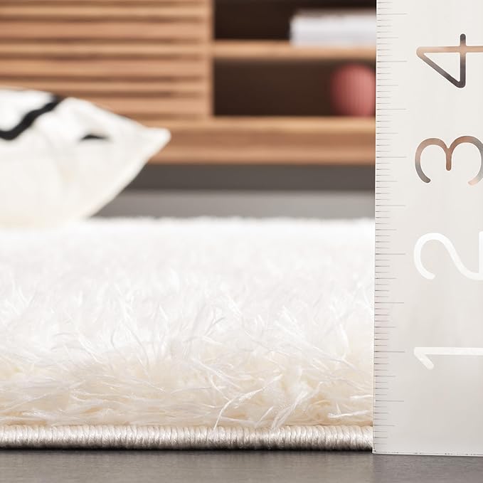 SAFAVIEH Lindsay Shag Collection Area Rug - 5'3" x 7'6", Ivory, Solid Design, Plush 1.8-inch Thick, Ideal for High Traffic Areas in Living Room, Bedroom, Dining Room (LNS560A-5)