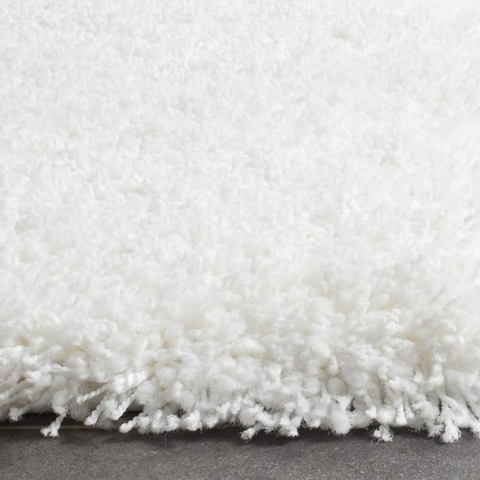 SAFAVIEH Santa Monica Shag Collection Area Rug - 9' x 12', White, Solid Design, Non-Shedding & Easy Care, 2-inch Thick Ideal for High Traffic Areas in Living Room, Bedroom (SGN725-1010)