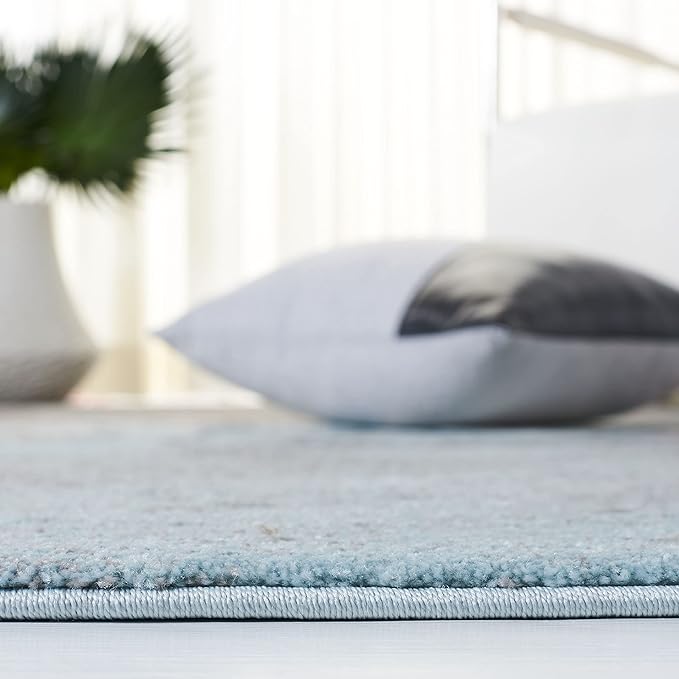 SAFAVIEH Glacier Collection Area Rug - 5'3" x 7'6", Blue & Pink, Modern Abstract Design, Non-Shedding & Easy Care, Ideal for High Traffic Areas in Living Room, Bedroom (GLA125L)