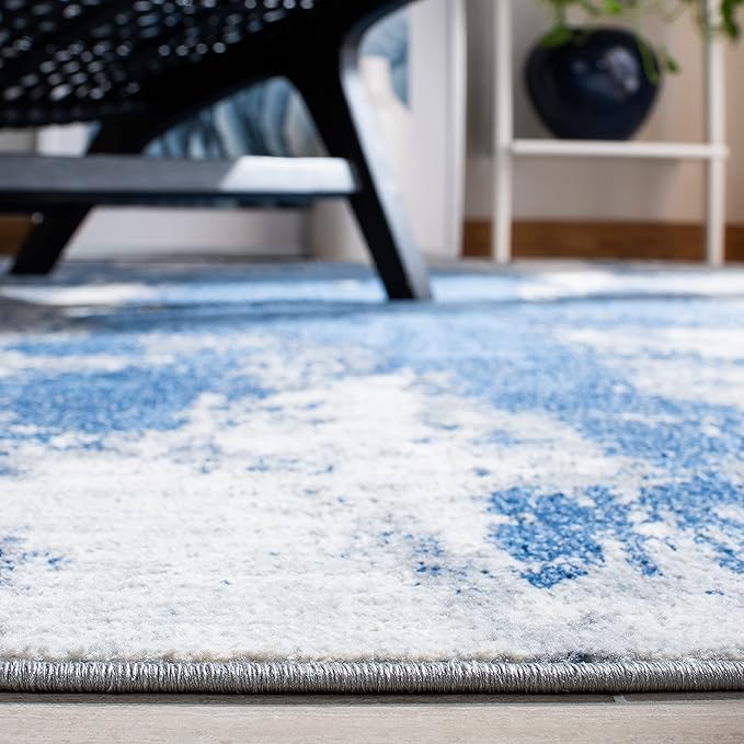 SAFAVIEH Jasper Collection Accent Rug - 3' x 5', Blue & Ivory, Modern Abstract Design, Non-Shedding & Easy Care, Ideal for High Traffic Areas in Entryway, Living Room, Bedroom (JSP101M)
