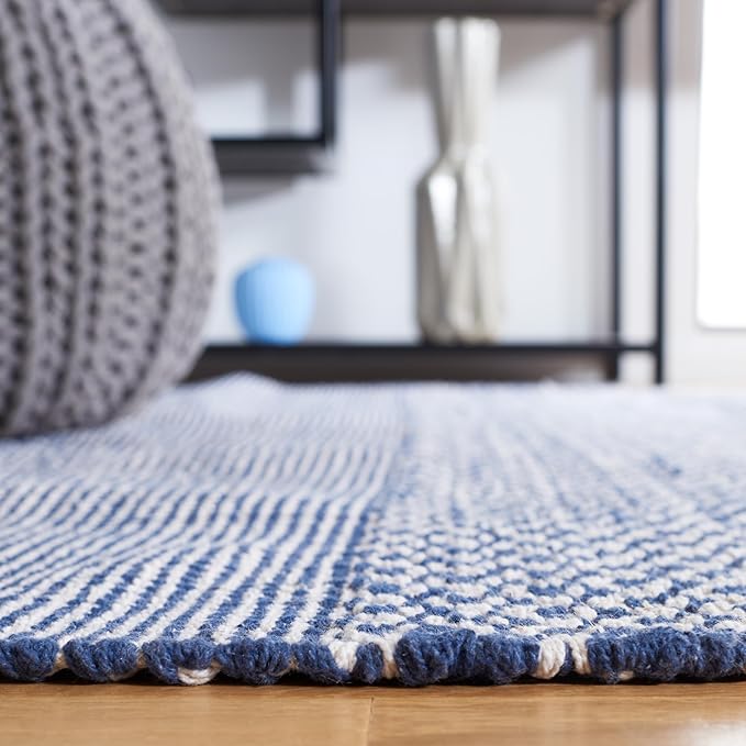 SAFAVIEH Montauk Collection X-Large Area Rug - 11' x 15', Ivory & Navy, Handmade Flat Weave Boho Farmhouse Cotton Tassel Fringe, Ideal for High Traffic Areas in Living Room, Bedroom (MTK330B)