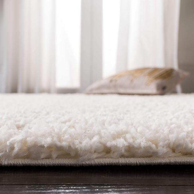 SAFAVIEH Fontana Shag Collection Area Rug - 6'7" x 9', Ivory, Solid Design, Non-Shedding & Easy Care, 2-inch Thick Ideal for High Traffic Areas in Living Room, Bedroom (FNT800A)
