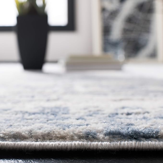 SAFAVIEH Amelia Collection Area Rug - 5' Round, Ivory & Blue, Modern Abstract Design, Non-Shedding & Easy Care, Ideal for High Traffic Areas in Living Room, Bedroom (ALA700A)