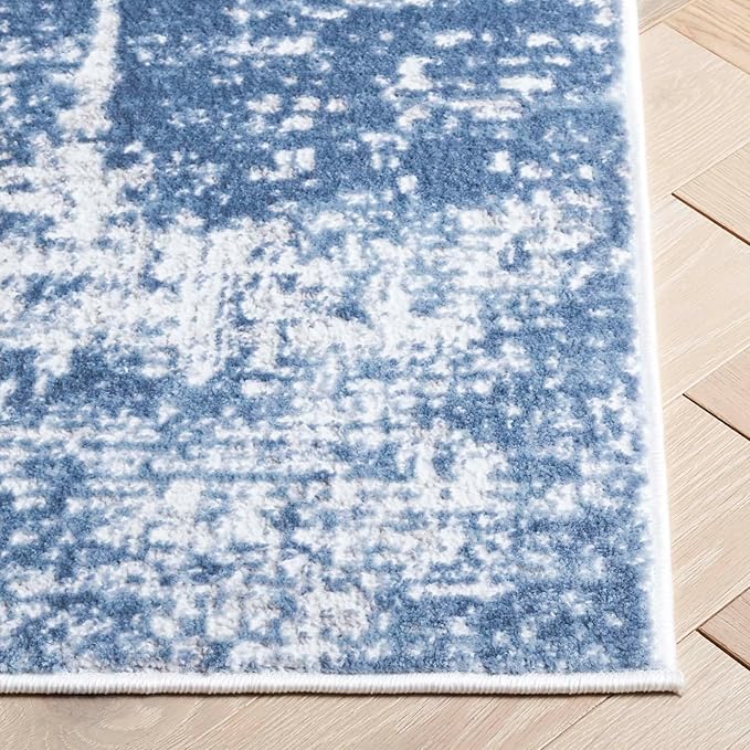SAFAVIEH Amelia Collection Area Rug - 9' x 12', Ivory & Steel Blue, Modern Abstract Design, Non-Shedding & Easy Care, Ideal for The Living Room, Dining, Bedroom (ALA700D)