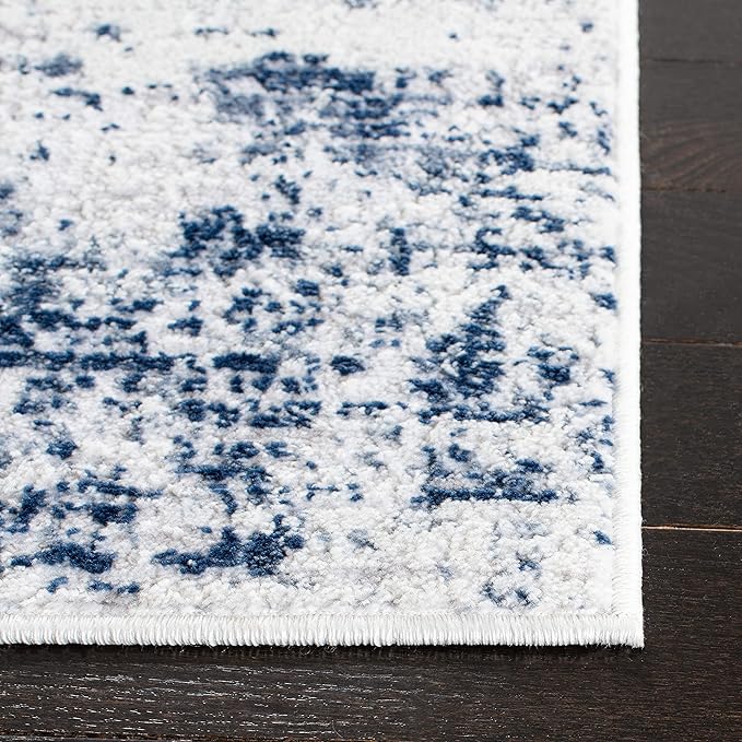 SAFAVIEH Amelia Collection Accent Rug - 2'2" x 4', Ivory & Navy, Modern Abstract Design, Non-Shedding & Easy Care, Ideal for High Traffic Areas in Entryway, Living Room, Bedroom (ALA700B)