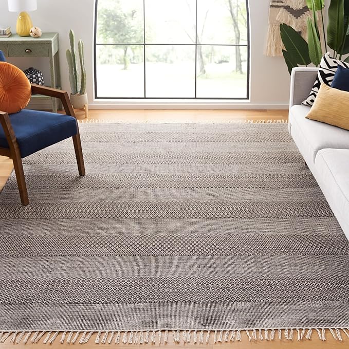 SAFAVIEH Montauk Collection Area Rug - 9' x 12', Ivory & Anthracite, Handmade Flat Weave Boho Farmhouse Cotton Tassel Fringe, Ideal for High Traffic Areas in Living Room, Bedroom (MTK330N)