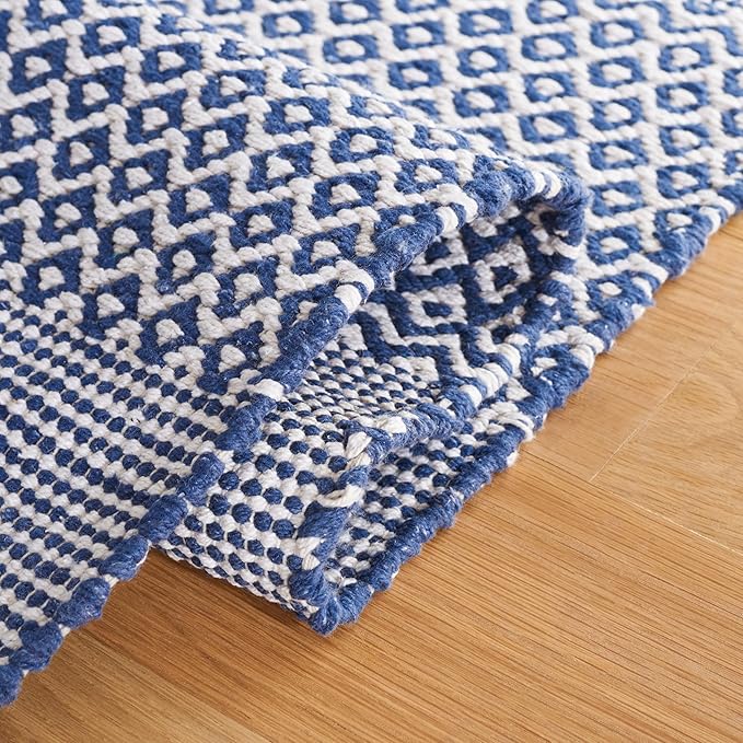 SAFAVIEH Montauk Collection Area Rug - 8' Round, Ivory & Navy, Handmade Flat Weave Boho Farmhouse Cotton Tassel Fringe, Ideal for High Traffic Areas in Living Room, Bedroom (MTK330B)