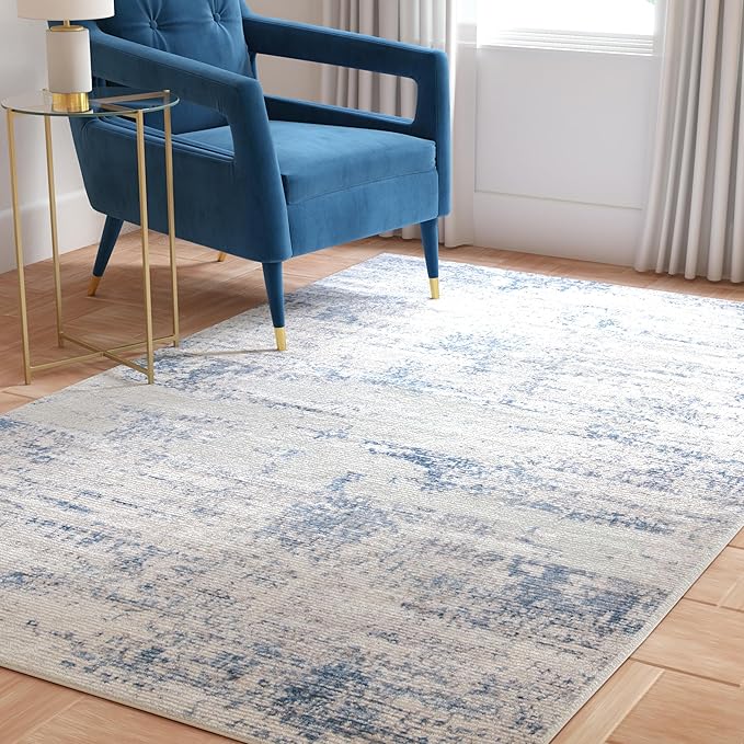 SAFAVIEH Amelia Collection Area Rug - 6' x 9', Ivory & Blue, Modern Abstract Design, Non-Shedding & Easy Care, Ideal for High Traffic Areas in Living Room, Bedroom (ALA700A)
