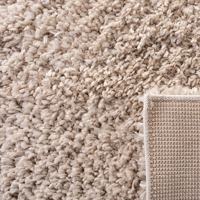 SAFAVIEH August Shag Collection Area Rug - 9' x 12', Beige, Solid Design, Non-Shedding & Easy Care, 1.5-inch Thick Ideal for High Traffic Areas in Living Room, Bedroom (AUG200D)
