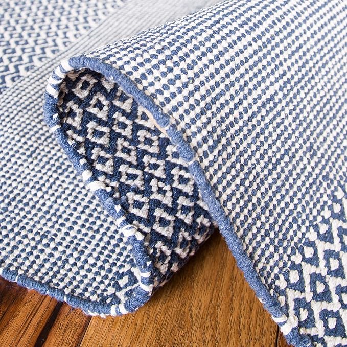SAFAVIEH Montauk Collection Runner Rug - 2'3" x 8', Ivory & Navy, Handmade Flat Weave Boho Farmhouse Cotton Tassel Fringe, Ideal for High Traffic Areas in Living Room, Bedroom (MTK330B)