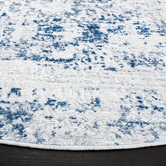 SAFAVIEH Amelia Collection Area Rug - 9' Round, Ivory & Navy, Modern Abstract Design, Non-Shedding & Easy Care, Ideal for High Traffic Areas in Living Room, Bedroom (ALA700B)