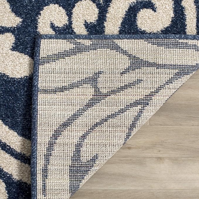 SAFAVIEH Amherst Collection Area Rug - 5'3" x 8', Navy & Ivory, Floral Design, Non-Shedding & Easy Care, Ideal for High Traffic Areas in Living Room, Bedroom (AMT425P)