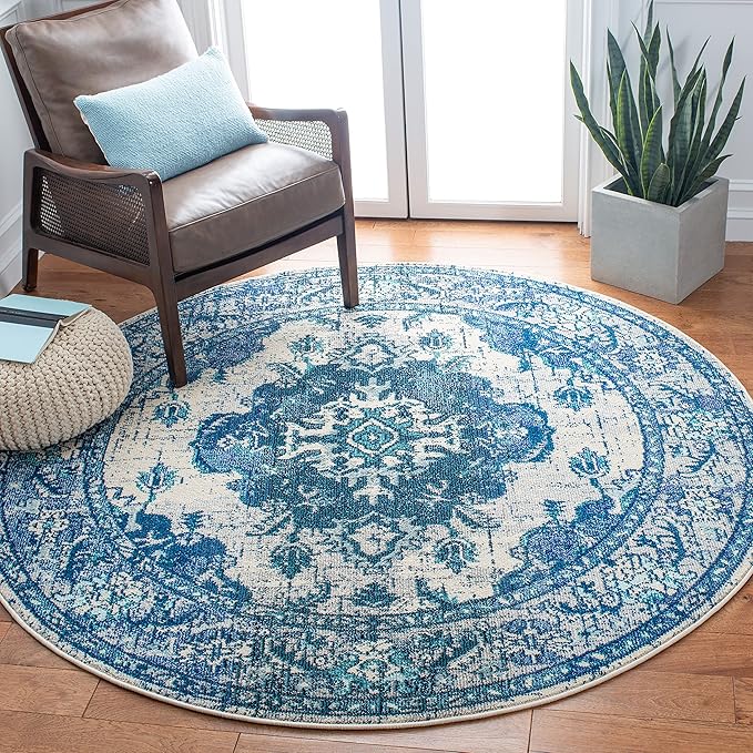 SAFAVIEH Monaco Collection Area Rug - 8' x 10', Ivory & Blue, Non-Shedding & Easy to Clean, Distressed Medallion Design, Ideal for Living Room, Bedroom, Dining Space (MNC243A)