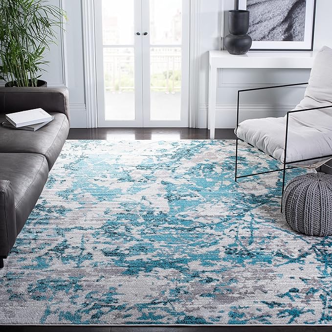 SAFAVIEH Skyler Collection Area Rug - 9' x 12', Blue & Ivory, Modern Abstract Design, Non-Shedding & Easy Care, Ideal for High Traffic Areas in Living Room, Bedroom (SKY186M)