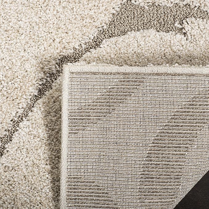 SAFAVIEH Florida Shag Collection Area Rug - 5'3" x 7'6", Cream & Beige, Scroll Design, Non-Shedding & Easy to Clean, High-Low Plush Pile, Ideal for Living Room, Bedroom, Dining Space (SG455-1113)